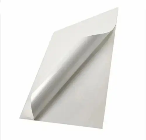 Coated self-adhesive label stock with its backing liner peeled back